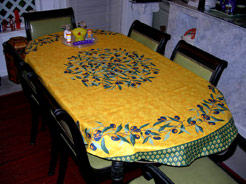 oval tablecloth coated with olive design