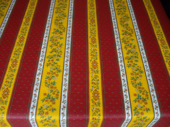 red and yellow coated tablecloth from provence