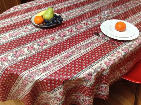 red provencal coated tablecloth that can be wiped over