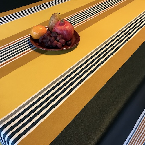 yellow and grey coated stripes tablecloth