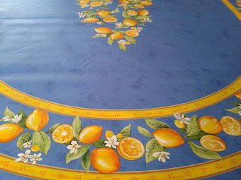 blue coated tablecloth with lemon design