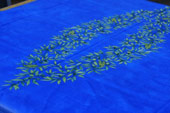 wipe over tablecloth with olive design