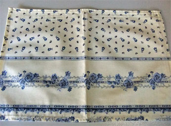 yellow and blue coated placemat from provence