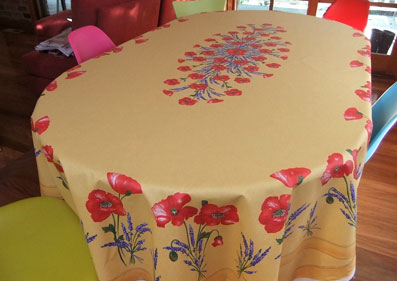 large oval coated tablecloth with poppies design