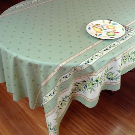 green coated tablecloth with provencal designs