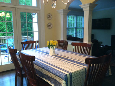 blue and white coated french tablecloth