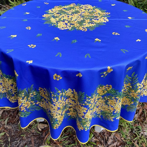 70in round treated tablecloth mimosa design